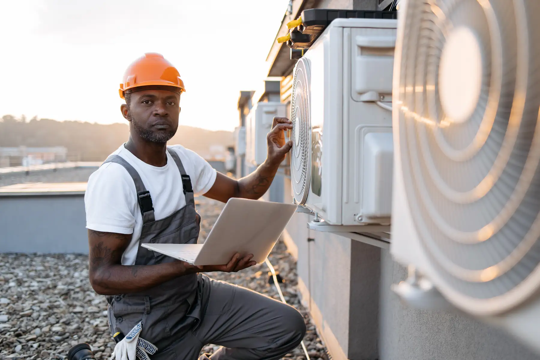 Professional technician performing deep cleaning of AC evaporator coils during maintenance service in Dubai removing dirt buildup for enhanced cooling efficiency and performance