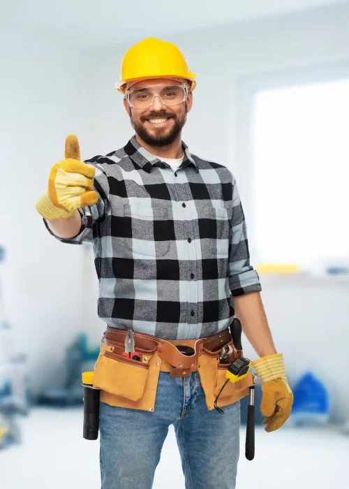 Skilled handyman painting bedroom walls with roller and professional painting techniques achieving smooth finish in elegant Dubai villa interior residential space