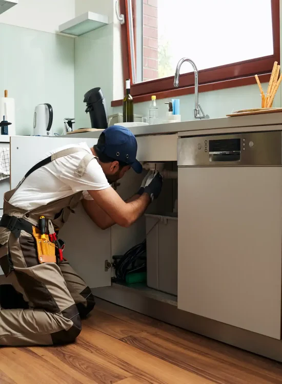 Expert plumber clearing and repairing main sewer line blockage in Dubai property using hydro-jetting equipment and modern techniques for effective cleaning