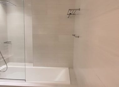 Complete Washroom with Wall Tiling, Glass Partition, Bath Tub & Vanity Installation